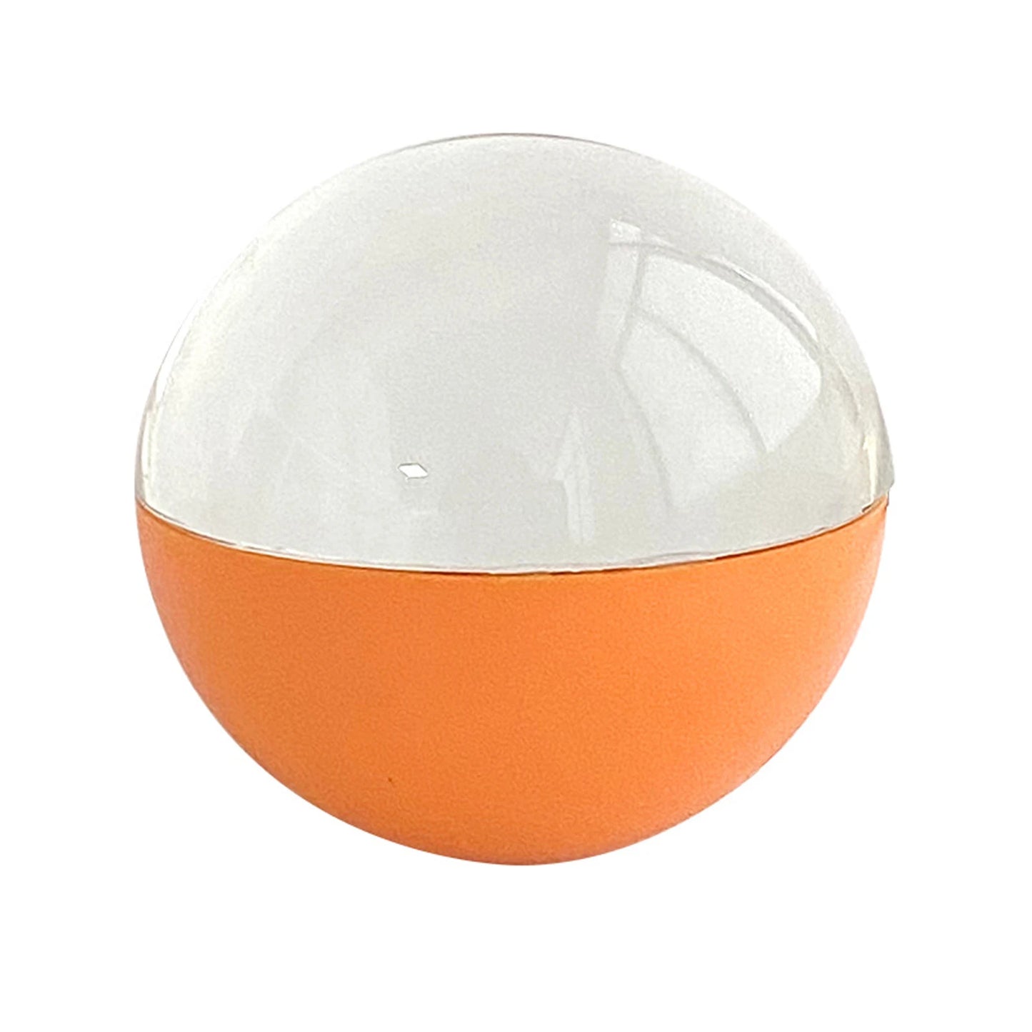 Spherical object with orange bottom half and clear top half on a white background